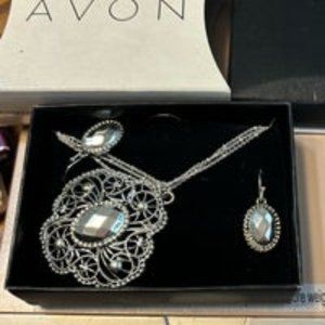 Avon silver colored jewelry set